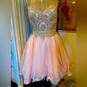 Adorable girls dress. Pink with gold details.